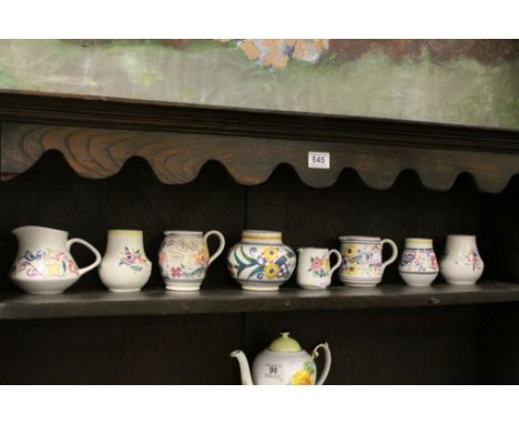 Small quantity of vintage Poole Pottery, various hand painted designs to include Fuschia pattern by Audrey Miles (1938-42)