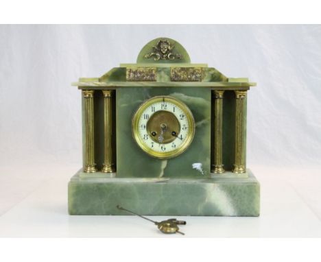 Antique onyx bracket/mantle clock of classical form with two train movement 