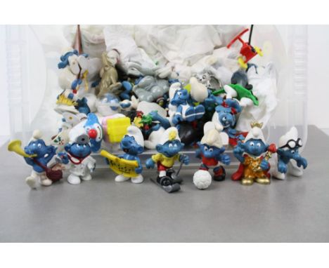 Box of mixed vintage Smurf figures &amp; a small quantity of ceramic Wade Whimsies