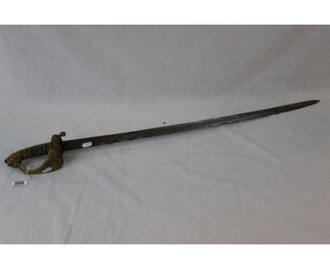 A Victorian Pipe Backed Royal Navy Officers Sword, Lions head pommel with wire bound shagreen grip. Folding guard. Queens cro