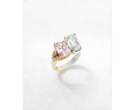 BOODLES: TWO-STONE FANCY COLOURED DIAMOND AND DIAMOND RINGThe cushion-shaped Fancy Purplish Pink diamond, weighing 2.52 carat