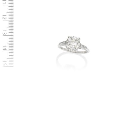 DIAMOND SINGLE-STONE RINGThe old brilliant-cut diamond, weighing 3.28 carats, between tapered baguette-cut diamond shoulders,