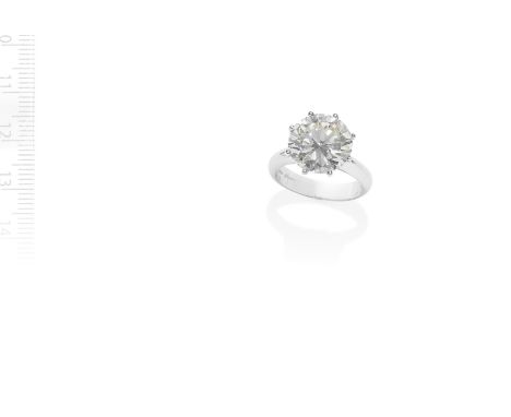 DINACCI: DIAMOND SINGLE-STONE RINGSet with a brilliant-cut diamond, weighing 6.41 carats, within an eight-claw setting, signe