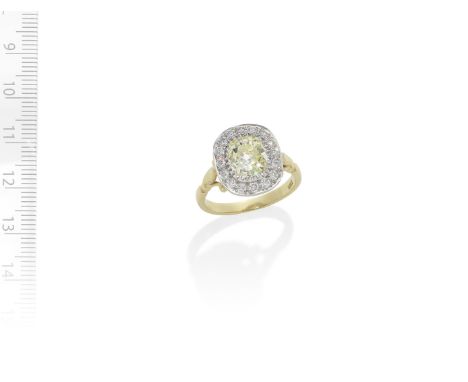 DIAMOND CLUSTER RINGThe old cushion-shaped diamond within a brilliant-cut diamond surround, between trifurcated shoulders, pr