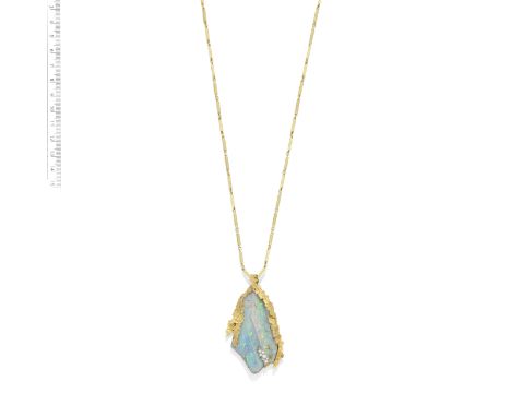 GRIMA: GOLD, OPAL AND DIAMOND PENDANT/NECKLACE, 1969The pendant set with an irregularly-shaped opal within a textured frame r