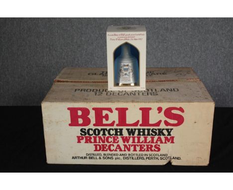 Bell's Whisky. An open box of nine unopened presentation decanter bottles. Special edition, issued 1982 to commemorate the . 