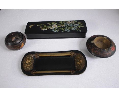 A lacquered box, ashtray, trinket box and a small tray. H.20 W.9cm. (largest) 