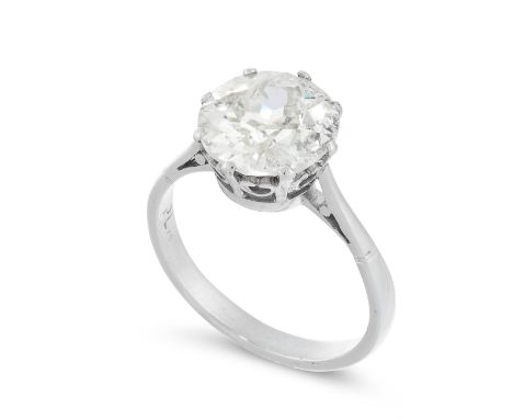 A SOLITAIRE DIAMOND DRESS RING in platinum, set with an old cut diamond of 2.47 carats, stamped Plat, size L / 5.75, 4.3g.