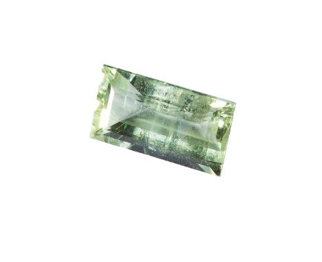 AN UNMOUNTED GREEN TOURMALINE of 4.39 carats, rectangular step cut.