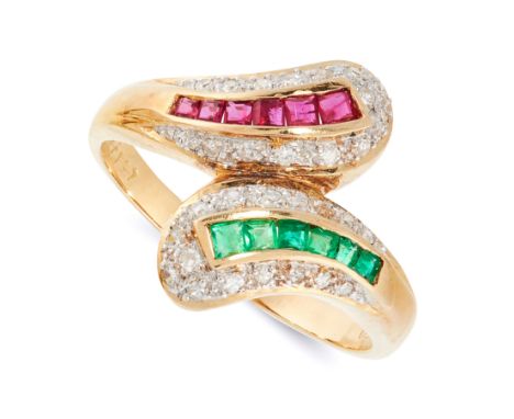 A DIAMOND, RUBY AND EMERALD CROSS OVER RING in 18ct yellow gold, in crossover design, set with round cut diamonds, step cut r