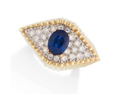 A VINTAGE SAPPHIRE AND DIAMOND RING, in 18ct yellow gold, set with an oval cut sapphire of 2.58 carats within a tapering eye 