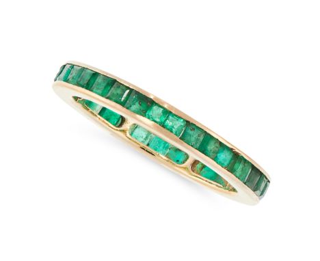 AN EMERALD ETERNITY RING in 18ct yellow gold, designed as a full eternity set with step cut emeralds, stamped 18K, size P / 7