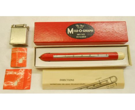 A vintage boxed Precision Mile-O-Graph - sold with a Hart petrol cigarette lighter