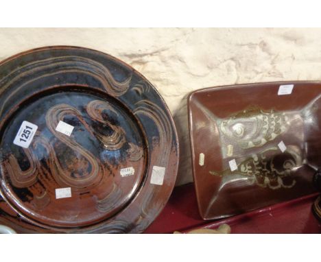 A Winchcombe Pottery Ray Finch stoneware dish decorated with combed tenmoku glaze - sold with an oblong fish decorated simila