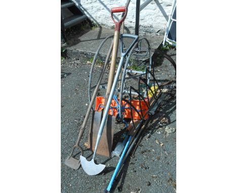 An assortment of garden items including galvanised hose reel, tools, etc.