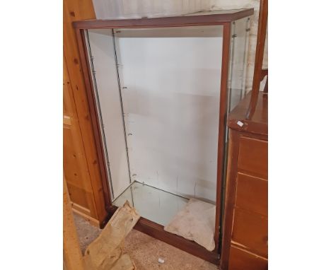 A 93cm vintage shop display cabinet with painted and clear glass panel and shelves enclosed by pair of glass sliding doors - 