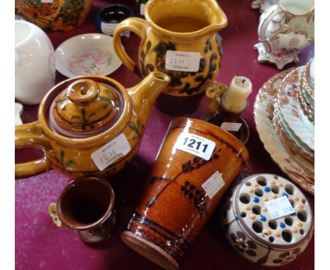 Six pieces of studio pottery including David Cleverly mouse candlestick and egg cup, jugs, teapots, etc.