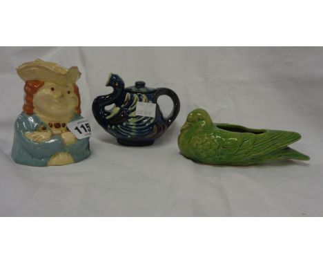 A Lauder Barum small Toby jug - sold with an unmarked Brannam novelty teapot in the form of a stylised swan, and a glazed pot