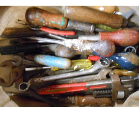 A bag of hand tools including screwdrivers, etc.