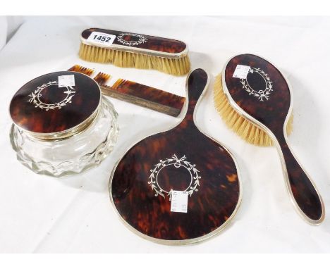 A pique work and silver mounted dressing table set, comprising hand mirror, two brushes and cut glass pot - Birmingham 1929 -