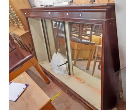 A 2.08m early 20th Century stained and painted wood wall mounted shop display cabinet with mirrored interior and metal shelf 