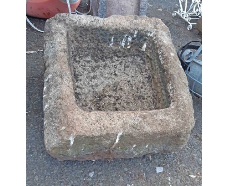 A small antique granite trough