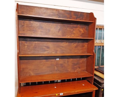 A 1.07m 20th Century oak four shelf open waterfall bookcase