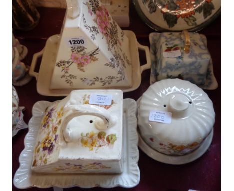 Four ceramic cheese dishes