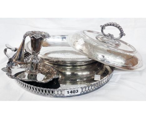 A silver plated entree dish with detachable handle, gallery tray and ornate chamber candlestick