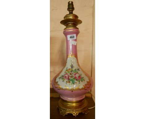 A Sevres style bottle vase lamp with pink ground, hand painted decoration and gilt brass mounts