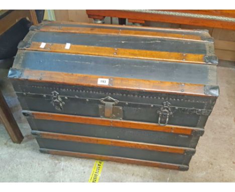 A 76cm 19th Century wooden battened and metal bound dome-top travelling trunk - interior poor, tray missing