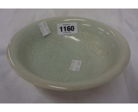 A David Leach celadon glaze bowl decorated with sgraffito flowers