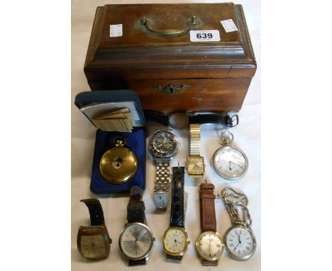An old tea caddy carcass containing pocket and wristwatches