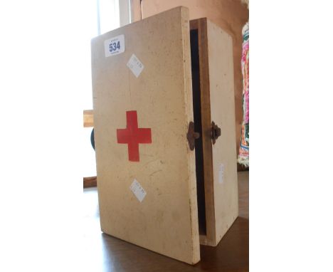 A small vintage wooden First Aid box