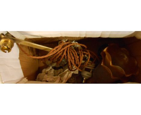 A brass rise and fall light pulley system