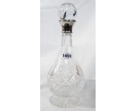 A cut glass baluster shaped decanter and stopper with silver rim collar - Birmingham 1997