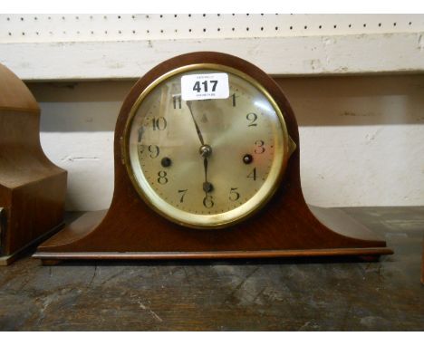 An early 20th Century mahogany cased Napoleon hat mantel clock with Gustav Becker eight day chiming movement