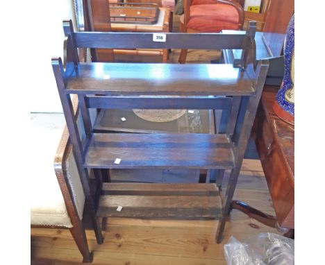 A 55cm 20th Century stained oak freestanding three shelf open bookcase