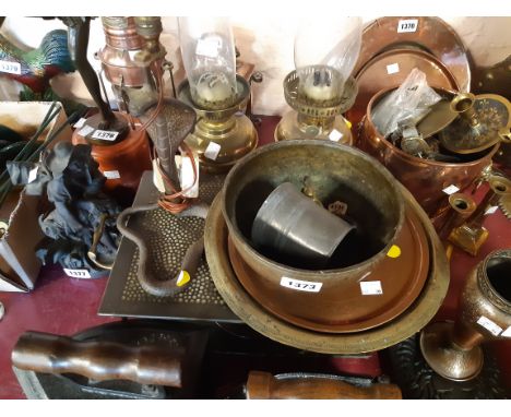 Various items of metalware including table heater, cobra pattern candlestick, plates, etc.