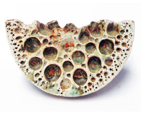 Alan Wallwork: a studio pottery sculptural vase of seed pod wedge form and salt glaze finish