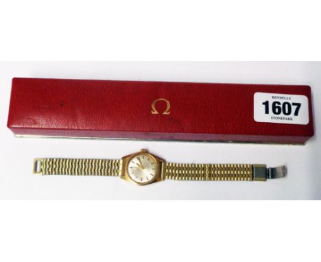 A vintage Omega lady's goldtone cased wristwatch with box (no papers), on associated NSA gold plated bracelet