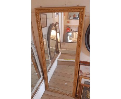 A 64cm X 1.6m vintage ornate gilt framed full length wall mirror - some restoration