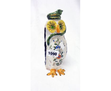 A faience pottery candlestick in the form of an owl with a cobra snake on its head - beak reattached
