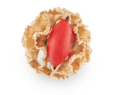 A VINTAGE CORAL DRESS RING in 18ct yellow gold, in modernist design, set with a cabochon coral in textured, naturalistic gold