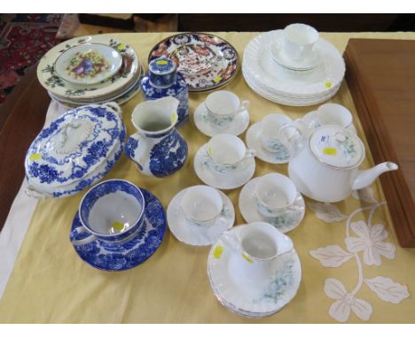 A Royal Stafford tea service, with hand painted floral designs, six Wedgwood dinner plates, three Royal Crown Derby plates, a