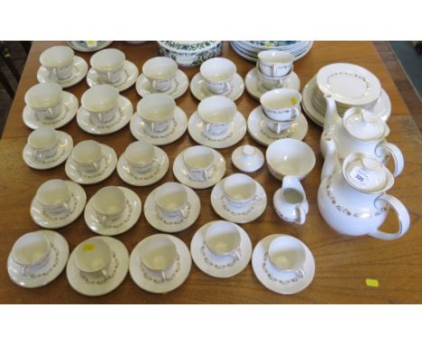 A Royal Doulton Fairfax tea and coffee service comprising twelve tea cups and saucers, twelve coffee cups and saucers, twelve