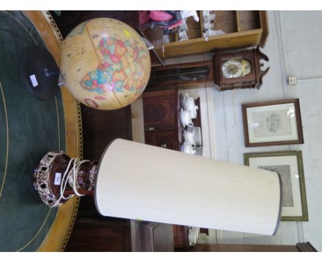 A 1970s brown glaze table lamp, a World Discoverer globe and a picnic hamper (3)