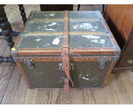 A Louis Vuitton cabin trunk, with internal label numbered 786106 and stamped buckles, lacks internal tray, 61cm wide 53cm dee
