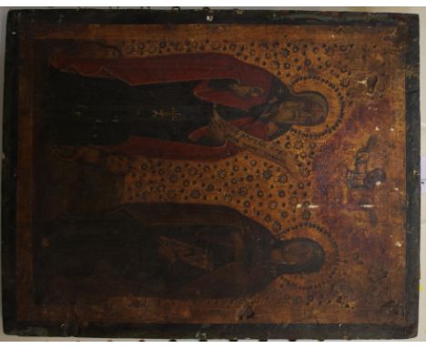 A Greek icon on panel, with Christ looking down on two figures, 32cm x 25cm