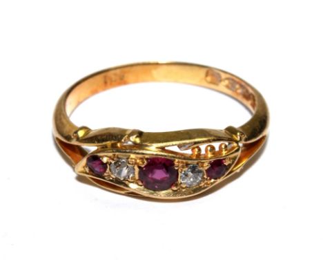 A diamond and ruby five stone ring set in 18 carat gold